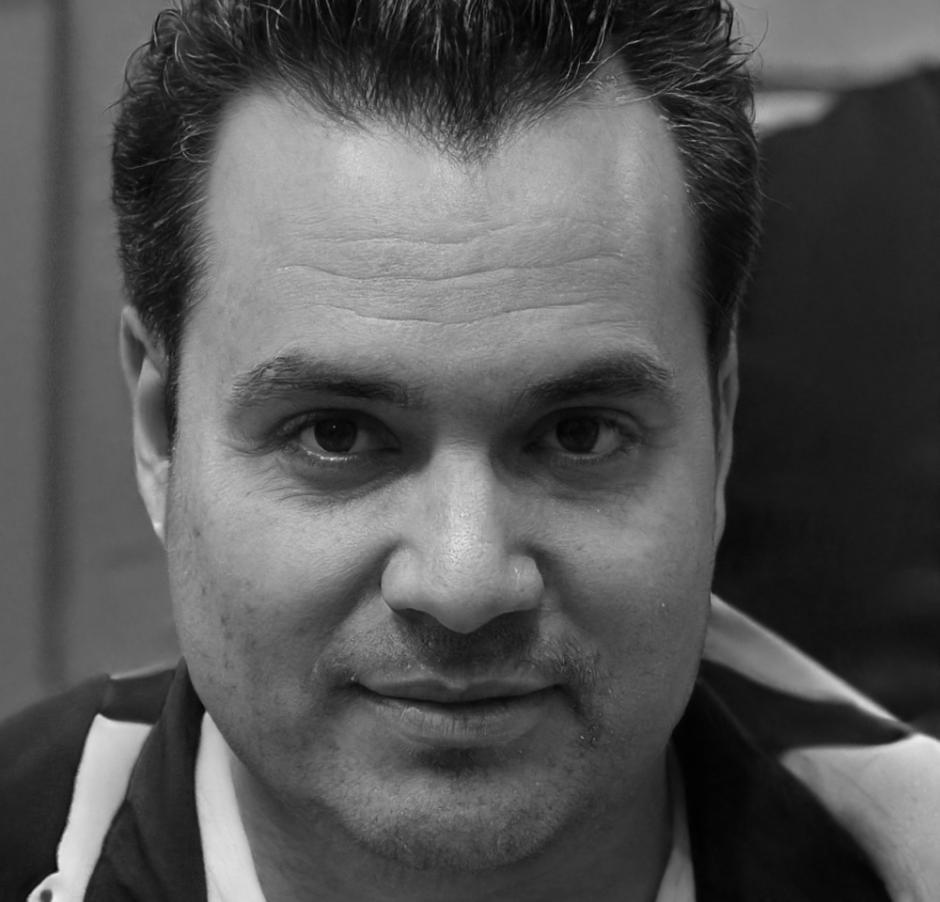 Ermal Hoxha - Technical Director reviewing student AR project